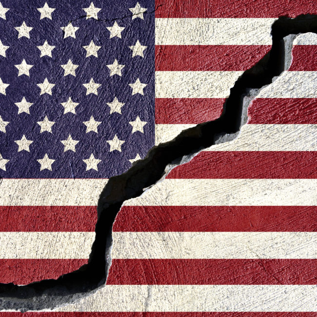 Concept american flag on cracked background